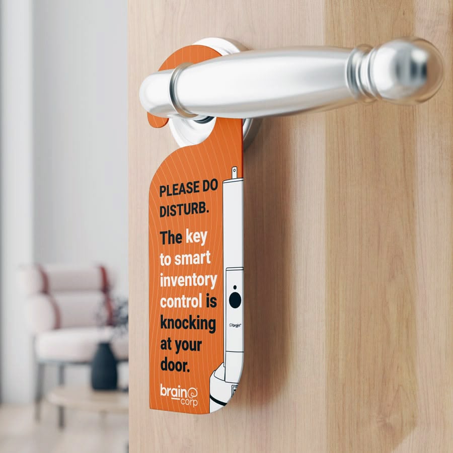 A branded door hanger reading "Please do disturb."